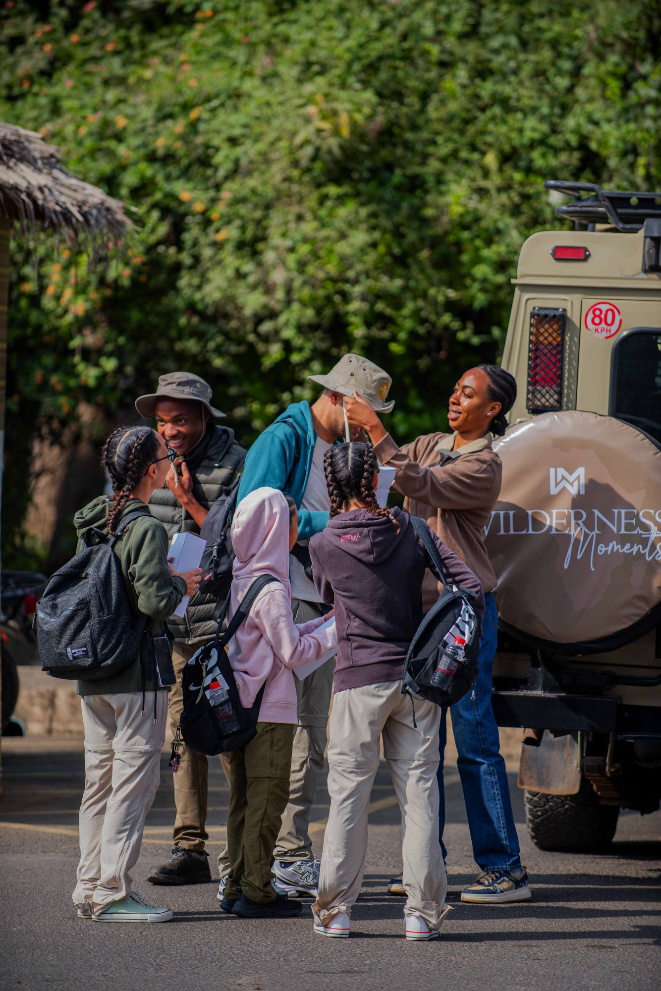 Guests and guide sharing a laugh at the start of the trip