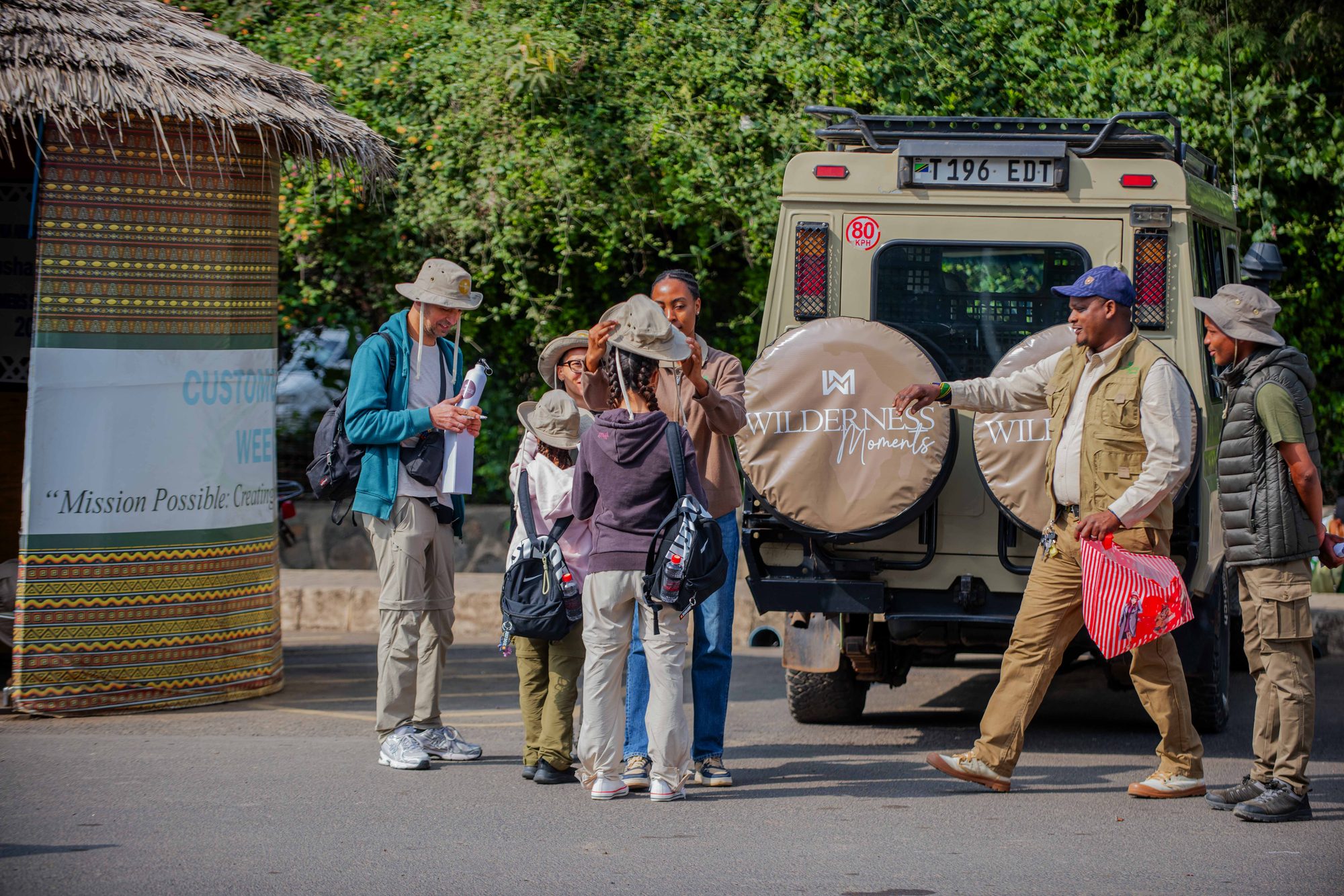 A warm welcome from our guide as guests arrive for their Tanzania safari