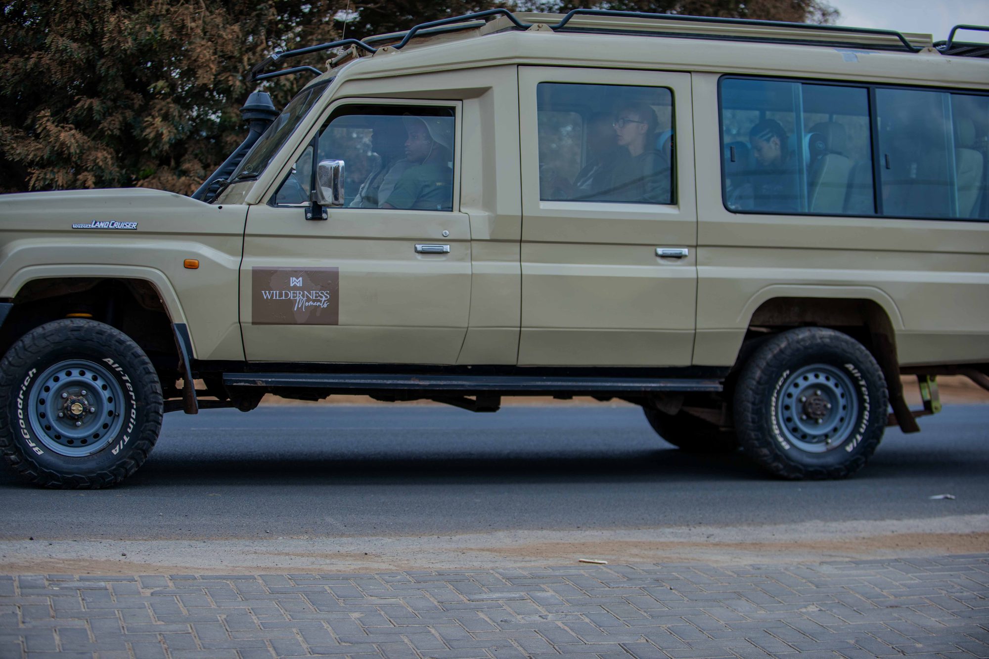 Guests chatting with our guide near the vehicle